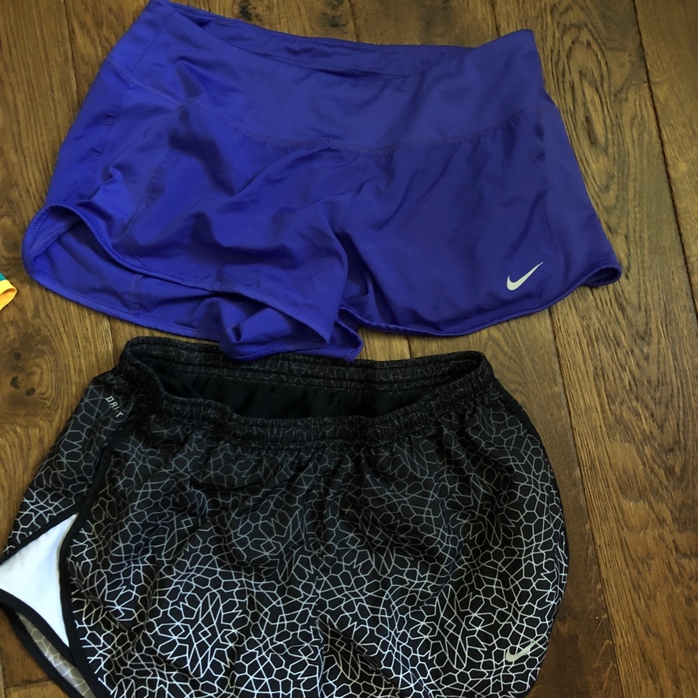 two pairs of nike shorts